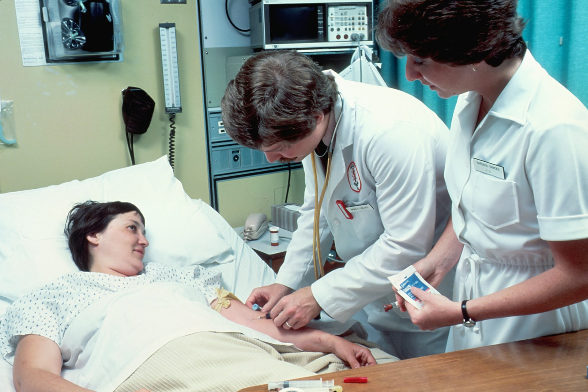 A DVT patient being assisted