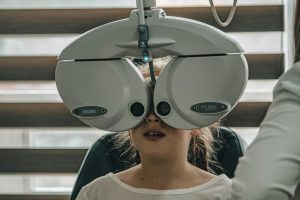 a girl undergoing eye test